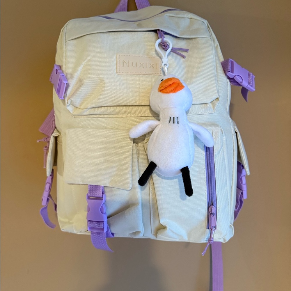 Cream Backpack with Purple Accents and Plush Keychain